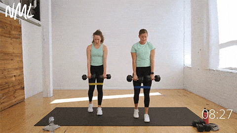 two women performing a staggered single leg deadlift as part of glute and core workout