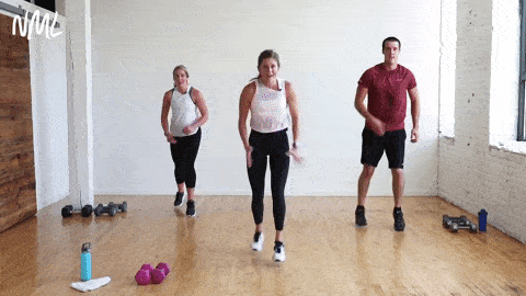 three people performing single leg lunge drops in a circuit training workout