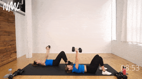 two women demonstrating dumbbell pull over and skull crushers as part of back and arm workout