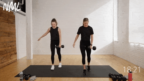 two women demonstrating a staggered deadlift and bicep curl combination move as part of functional workout