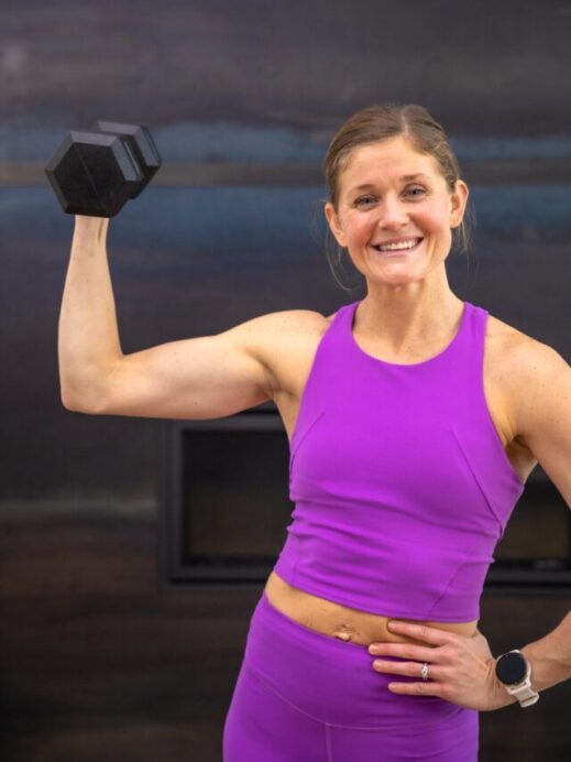 Toned arms workout for women - bicep flex holding dumbbell