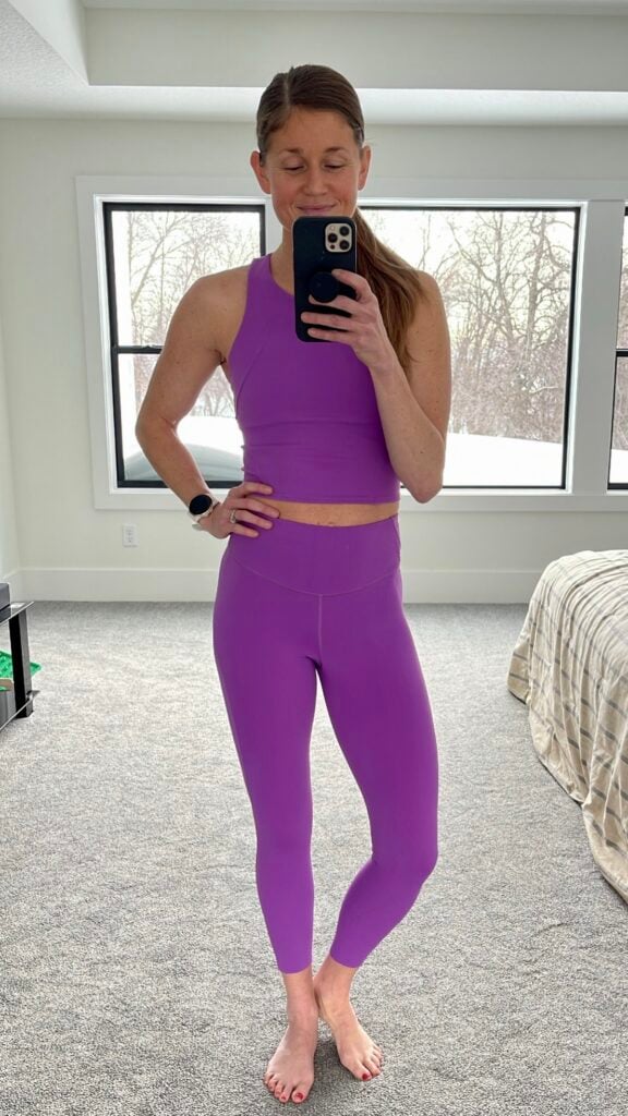 Lindsey wearing lululemon workout set - invogirate training tank top and base pace leggings