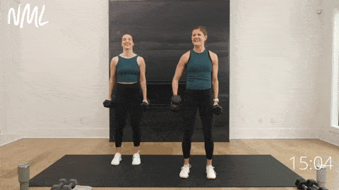 two women performing hammer curls as example of bicep exercise 