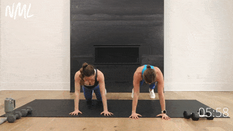 two women demonstrating plank up downs as part of intense ab workout