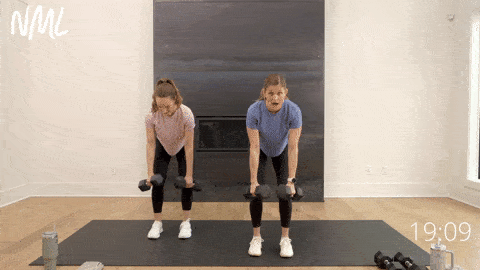 two women perming back rows as part of full body dumbbell workout