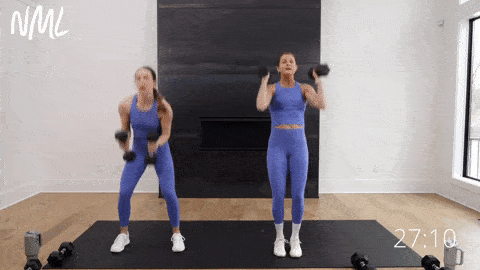 two women performing burpee and push press upper body hiit exercise