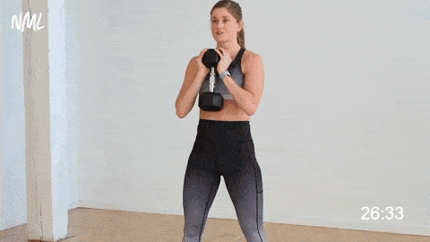 two pulse goblet squat 
exercise demoed as part of one dumbbell workout 