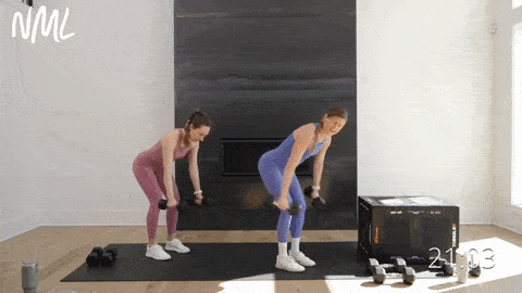 two women performing straight arm pull backs to target back and triceps muscles