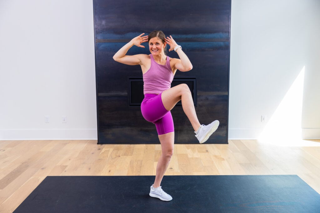 Four Week Challenge - woman performing a crossbody standing crunch