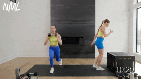 one woman performing bodyweight step ups on a box, another woman performing alternating step back lunges while holding a dumbbell at her chest