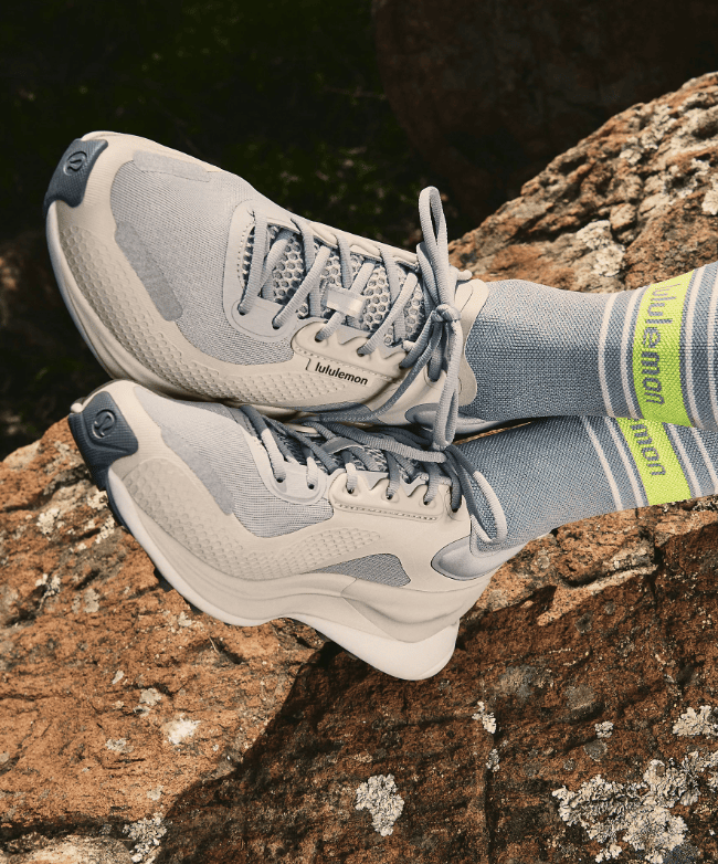 image of blissfeel trail running shoes on rocky path