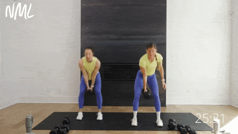 two women performing dumbbell swings as part of lower body workout with dumbbells