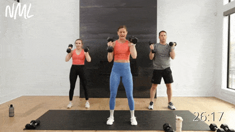 three people performing an uenven squat, bicep curl and shoulder press as part of cardio and strength workout