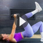 5-Minute Kettlebell Abs - pin for pinterest with woman holding a kettlebell in a front rack position