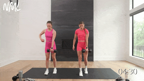 two women performing a staggered deadlift and reverse lunge in a full body workout at home