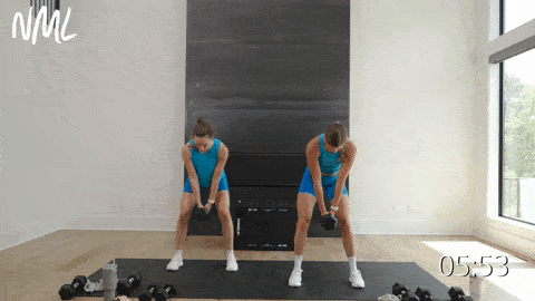 two women performing glute focused squats to build strong glutes in a lower body workout