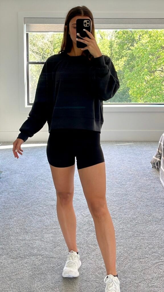 Caroline wearing perfectly oversized cropped crew lululemon sweatshirt