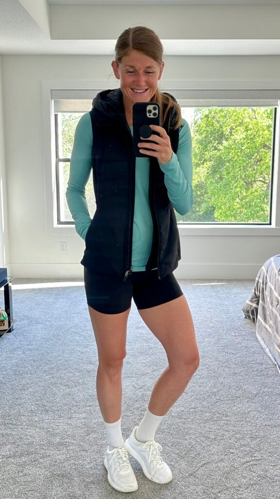Woman wearing Another Mile vest from lululemon as part of best lululemon jackets for fall review post