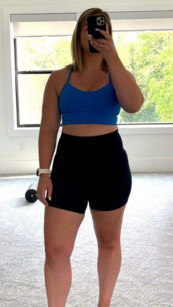 woman wearing lululemon flow y sports bra as part of review of best lululemon sports bras