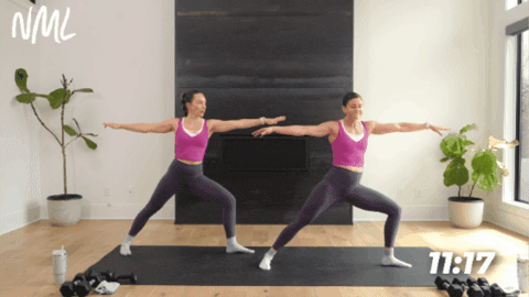 two women demonstrating warrior ii pose