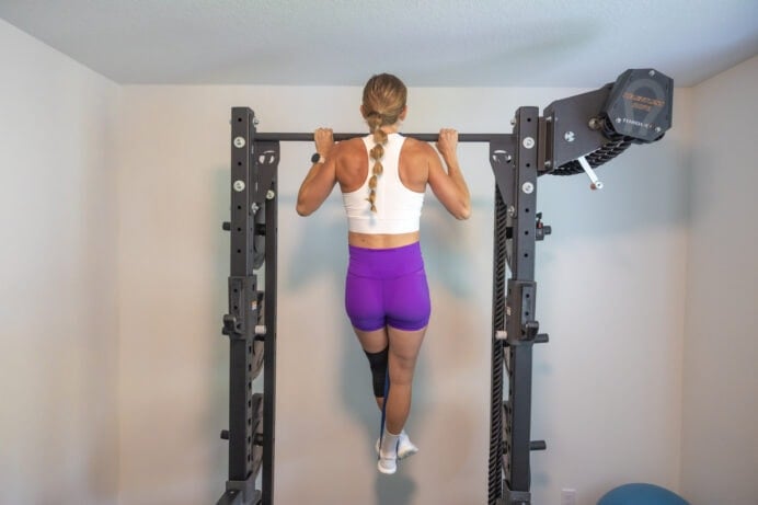 Women doing a pull up at home, to how how to do a pull up.