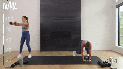 one woman performing a lateral bear crawl and dumbbell drag and one woman performing a dumbbell press and rotate as part of a total body workout