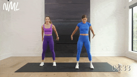 two women performing a squat and calf raise in a bodyweight workout at home