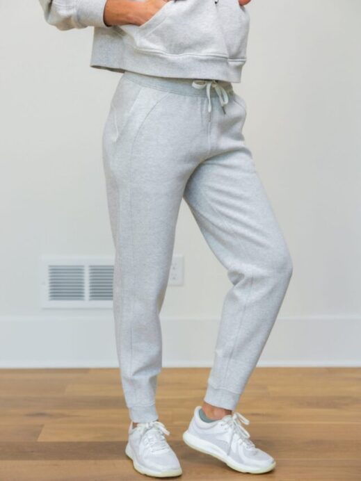 woman wearing gray scuba joggers as part of best lululemon joggers review post