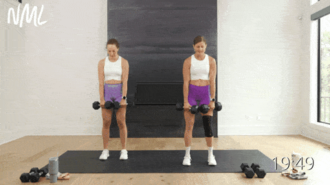 two women performing a romanian deadlift and calf raise as part of compound leg workout