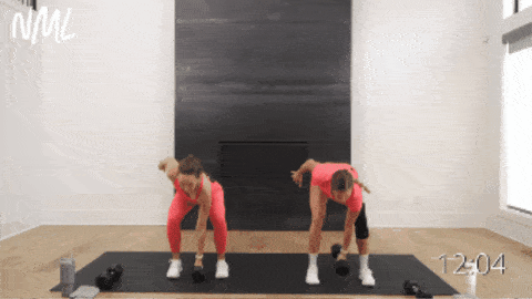 two women performing a single arm snatch and reverse lunge
