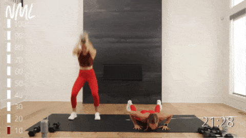 two women performing a burpee exercise