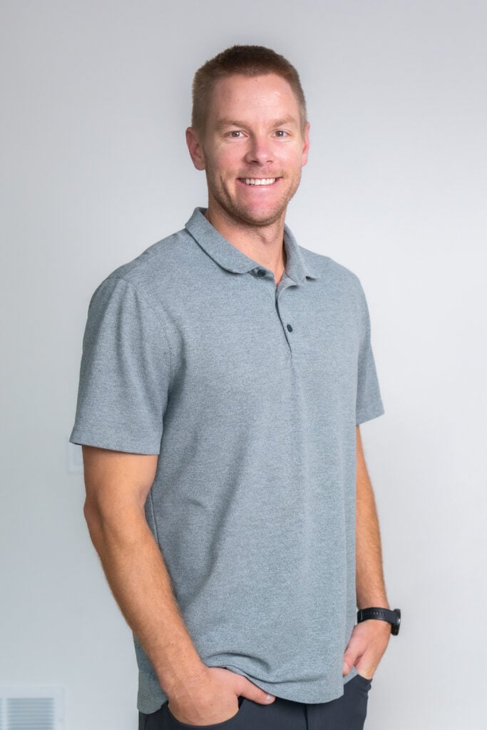 man wearing lululemon polo as part of gift ideas under $100 post