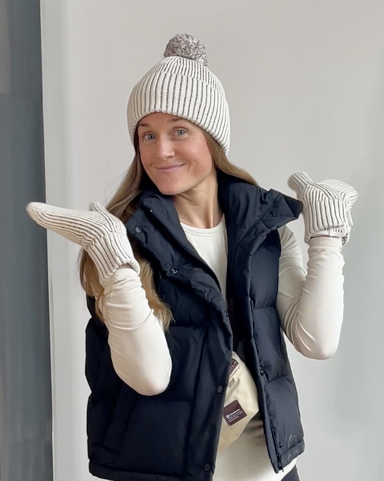 woman wearing lululemon pom pom hat as example of gifts under $100