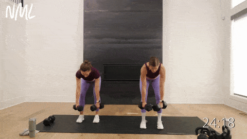 two women performing a dumbbell back row clean and overhead press in a full body workout