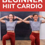 two women performing prisoner get ups as part of 15 min hiit workout