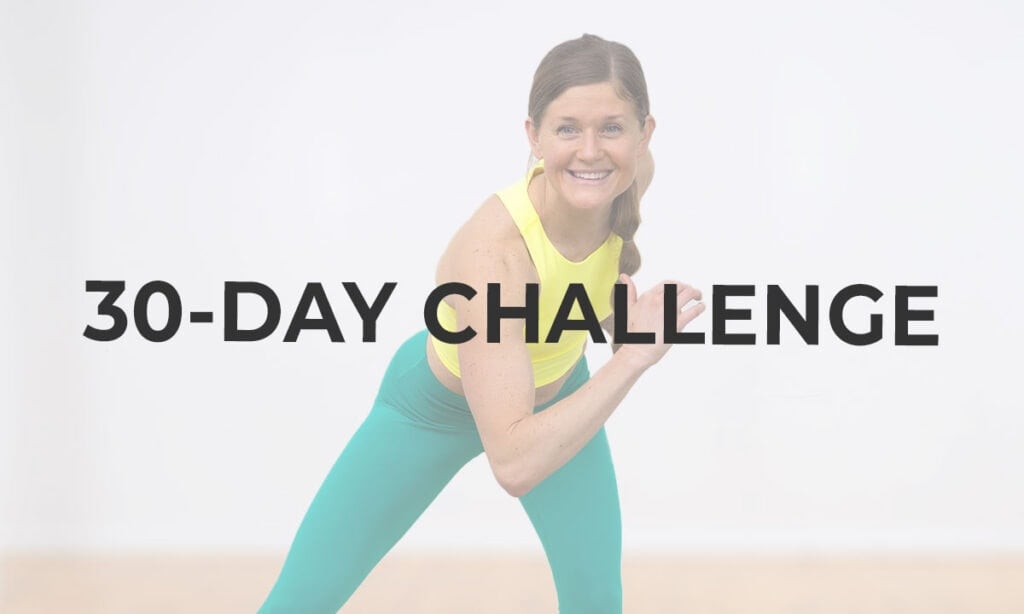 woman performing a standing workout as part of 30 day beginner workout plan