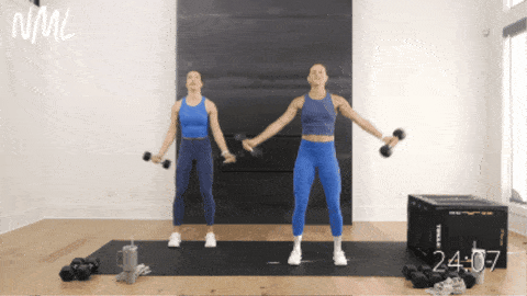 two women performing around the world shoulder raises
