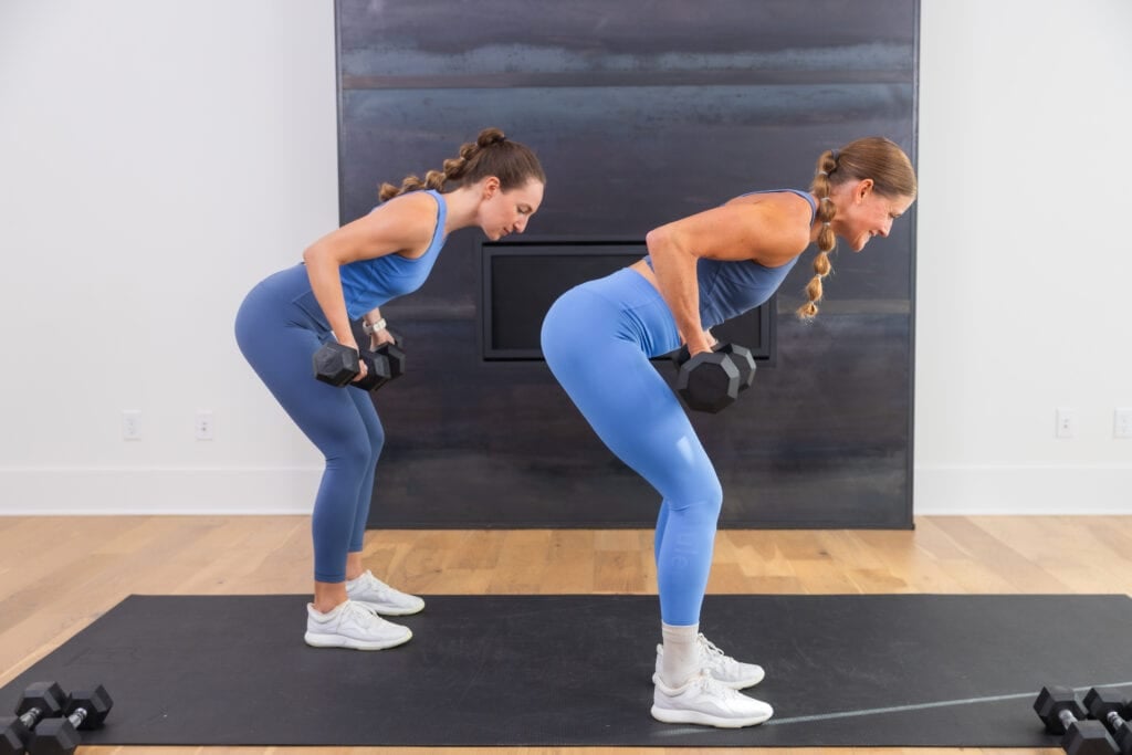 two women performing dumbbell back rows