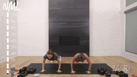 two women performing push ups as part of metabolic conditioning workout