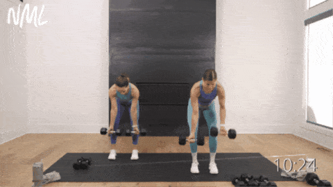 two women performing back rows as part of upper body dumbbell workout