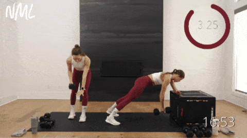 two women performing single arm back rows as example of best dumbbell exercises