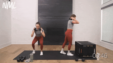 one woman performing step ups and one woman performing a staggered squat and knee drive in a glute workout