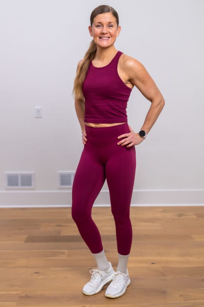 woman wearing red lululemon wunder under leggings as part of review of top items from lululemon 2024