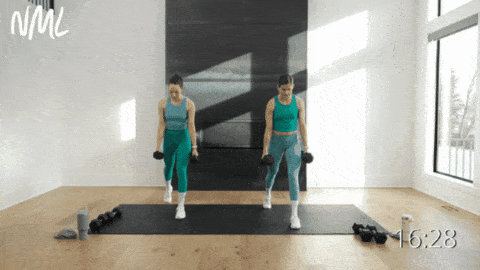 two women performing split lunges as example of dumbbell leg exercise