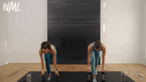 two women performing rear leg lifts as example of barre exercises