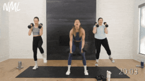 three women performing dumbbell burpees with a wide bicep curl