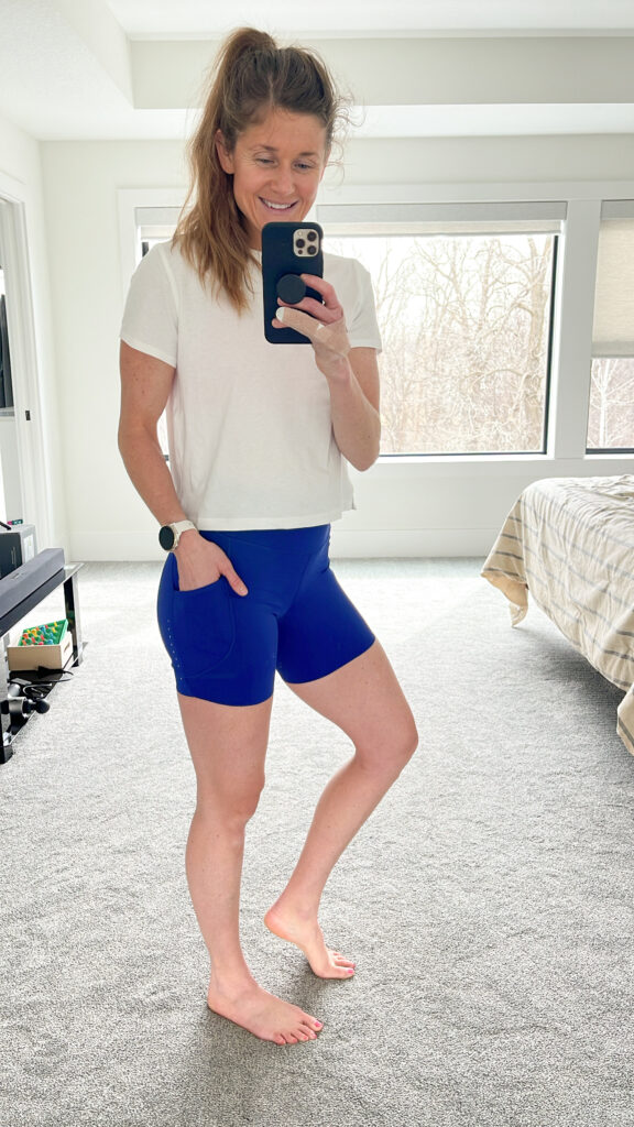 woman posing in lululemon biker shorts