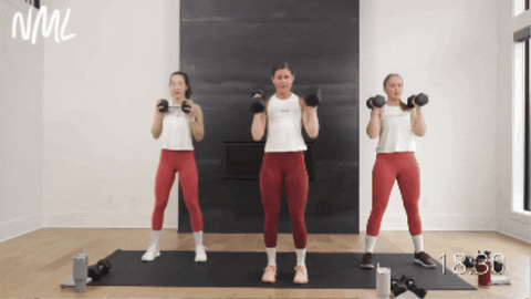 three women performing dumbbell burpees as example of best hiit exercises for women