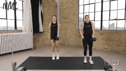 two women performing a lateral lunge and single arm back row