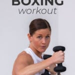 woman performing a hook as part of boxing workout